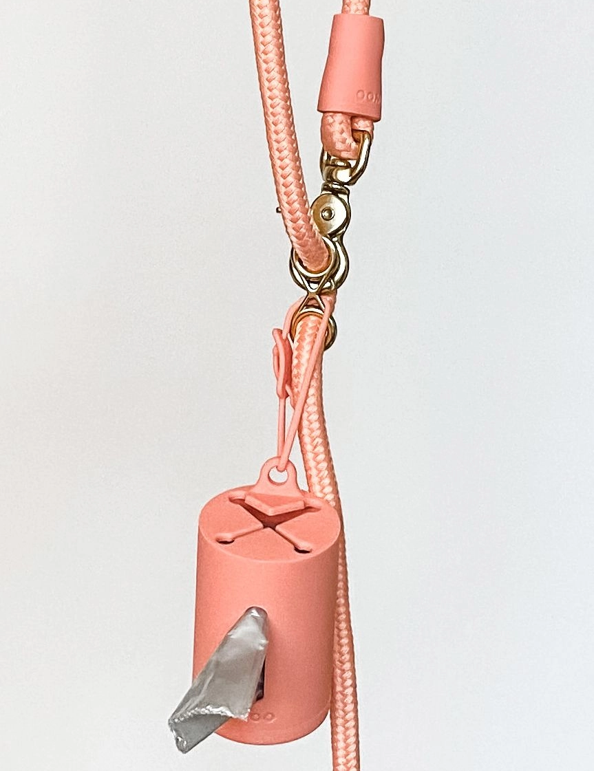 Distributeur de sacs à caca couleur Pêche - Muzon